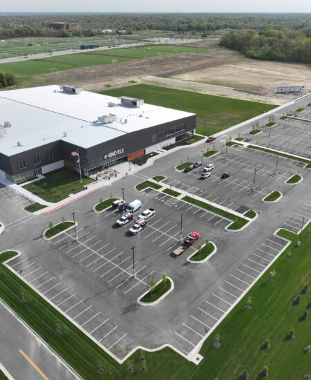 A building with two parking lots