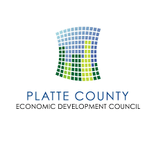 Platte County EDC logo with colorful wave of squares above text.